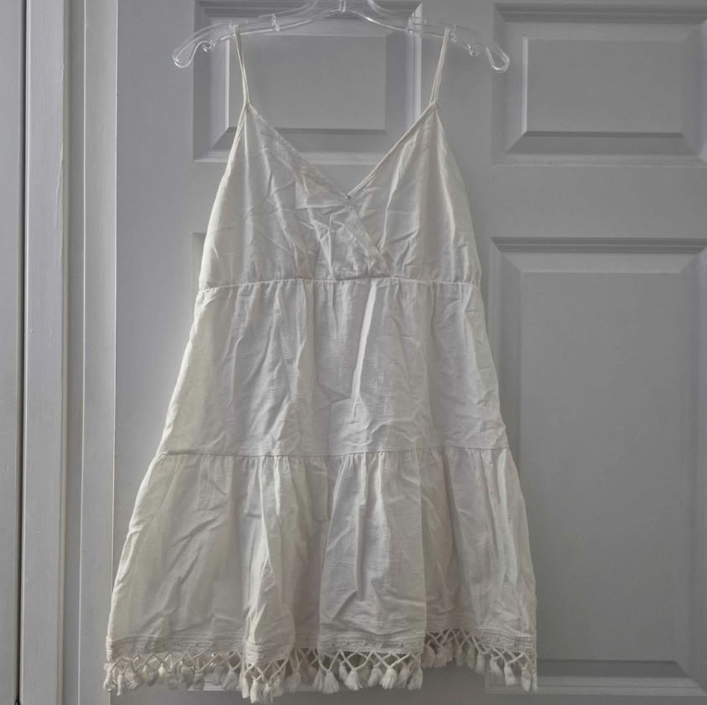 White Mini Dress With Tassel Hem